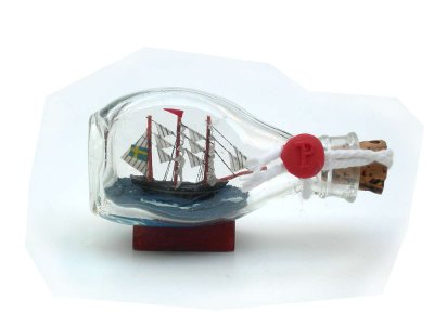 Small Ship in a bottle with Swedish flag